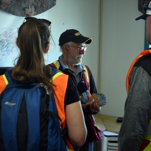 Troilus' Senior Project Geologist, Bertrand Brassard, with visitors